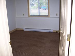 Superior apartment for rent - Image of room with one window and one baseboard heater