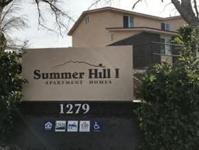 St. George apartment for rent - a sign for summer hill apartment homes in front of the property
