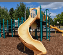 Caldwell apartment for rent - a slide at a playground on a sunny day