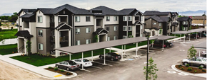 Caldwell apartment for rent - an aerial view of an apartment building with cars parked in a parking lot