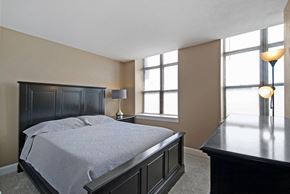 Saginaw apartment for rent - Spacious bedroom with natural light, walk-in closets, carpeting. Cozy one bedroom apartments in Saginaw.