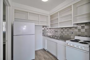 Warren apartment for rent - Apartment Kitchen with bright cabinets and ample storage in Warren, MI