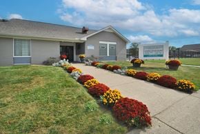 Clinton Twp apartment for rent - Leasing office at Farmbrooke Manor Apartments in Clinton Township MI with welcoming entrance and on-site parking