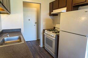 Roseville apartment for rent - Fully equipped kitchen at Golf Manor Apartments in Roseville, Michigan