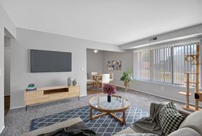 Warren apartment for rent - A living room with a flat screen TV mounted on the wall.