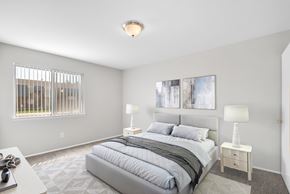 Warren apartment for rent - A bedroom with a large bed and two lamps.