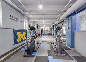 Grand Rapids apartment for rent - a gym with cardio machines and weight lifting at Lofts at 5 Lyon, in downtown Grand Rapids, MI