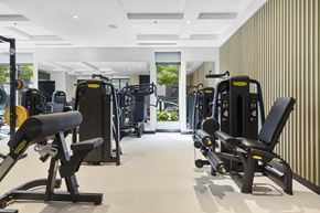 West New York apartment for rent - A gym with a variety of equipment including treadmills, weights, and exercise machines.