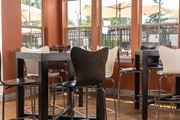 Carteret apartment for rent - Chair and table at Bristol Station Apartments, Carteret, NJ, 07008