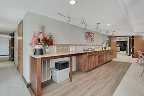 Lincoln apartment for rent - a long kitchen with a wooden counter top in a house