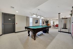 Lincoln apartment for rent - a game room with a pool table in the middle