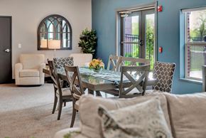 Lincoln apartment for rent - A dining room with a glass table and chairs.