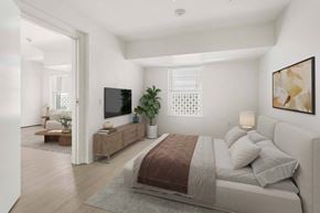Santa Monica apartment for rent - A bedroom with a large bed and a television.