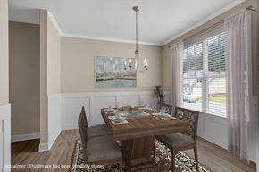Loganville apartment for rent - Elegant dining area bathed in natural light.