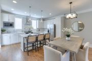 Franklin apartment for rent - A modern kitchen with a dining table and chairs.