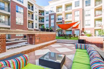 Gorgeous courtyard with gas grills, fire pit, and private cabanas