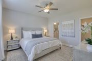 Antioch apartment for rent - Large bedroom with a ceiling fan at 1104 Residences houses for rent in Antioch, TN.