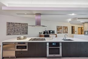 San Diego apartment for rent - Kitchen with a white counter top at K1 Apartments, San Diego, CA, 92101