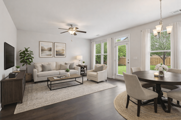 Loganville apartment for rent - A living room with a white couch and a coffee table.