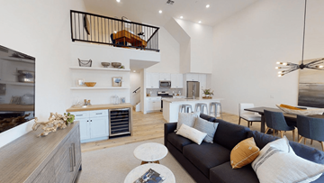 Phoenix apartment for rent - a living room with a couch and a kitchen in the background