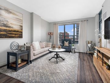 Chicago apartment for rent - a living room with a couch and a table