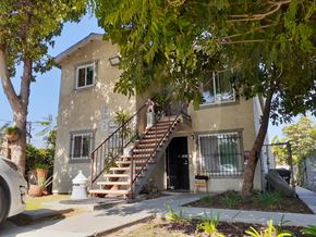 Los Angeles apartment for rent - A house with a staircase leading to the front door.