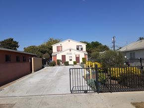 Los Angeles apartment for rent - A house with a black gate in front of it.