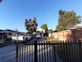 Los Angeles apartment for rent - A white truck is parked on a driveway.