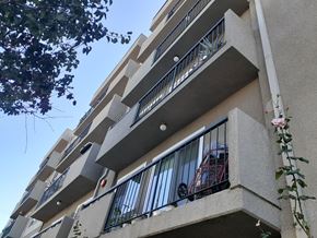 Los Angeles apartment for rent - an apartment building with a balcony and a blue sky