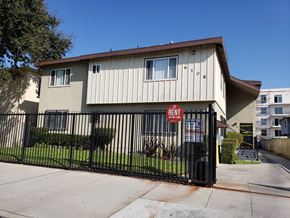 Los Angeles apartment for rent - A house with a rent sign in front of it.