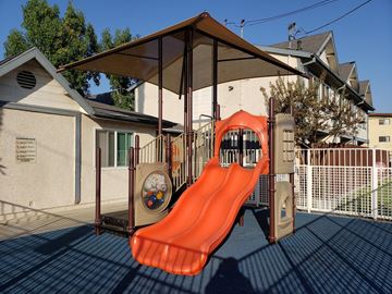 Wilmington apartment for rent - A playground with a slide and a climbing frame.
