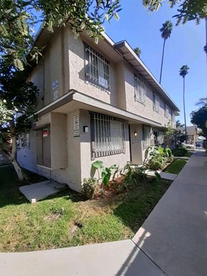 North Hollywood apartment for rent - A two-story house with a balcony on the second floor.