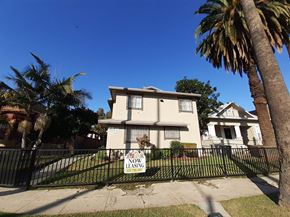 North Hollywood apartment for rent - A house with a "Now Leasing" sign in front of it.