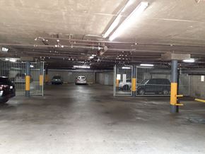 Los Angeles apartment for rent - the inside of a parking garage with cars in it