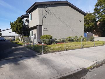 North Hollywood apartment for rent - A grey building with the number 6925 on it.