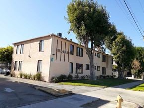 Panorama City apartment for rent - an apartment building with a yellow fire hydrant in front of it