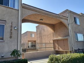 North Hills apartment for rent - a building with an archway in the middle of it