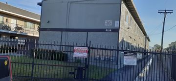 North Hollywood apartment for rent - A black fence with a red and white sign on it.
