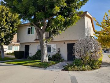 North Hollywood apartment for rent - A house with a tree in front of it.