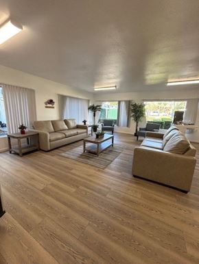 Eagle Rock apartment for rent - A spacious living room with wooden floors and furniture.