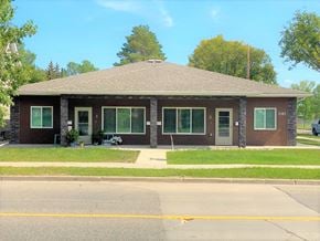 Brandon apartment for rent - a brown brick house with a street in front of it