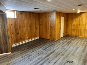 Brandon apartment for rent - an empty room with wooden walls and wooden floors