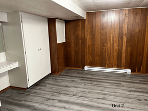 Brandon apartment for rent - an empty room with wood flooring and white walls