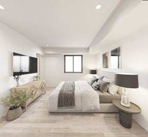 Brandon apartment for rent - the master bedroom has a large bed and a tv on the wall