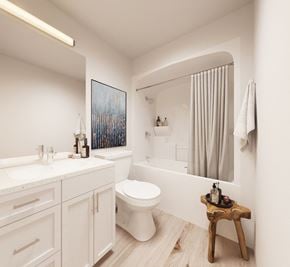Brandon apartment for rent - a white bathroom with a toilet and a sink