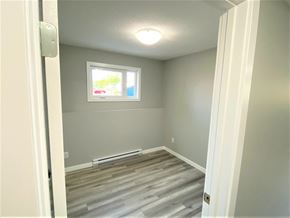 Brandon apartment for rent - a room with a hard wood floor and a window