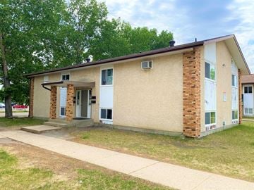 Brandon apartment for rent - an old brick building with a sidewalk in front of it