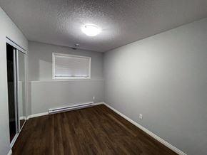 Brandon apartment for rent - the interior of a living room with wood flooring and a window