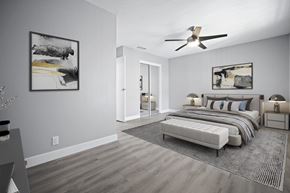 Madera apartment for rent - a bedroom with a bed and a ceiling fan