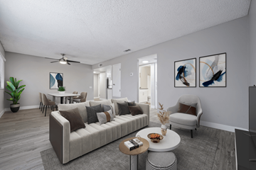 Indio apartment for rent - an open living room and dining room with a couch and a table